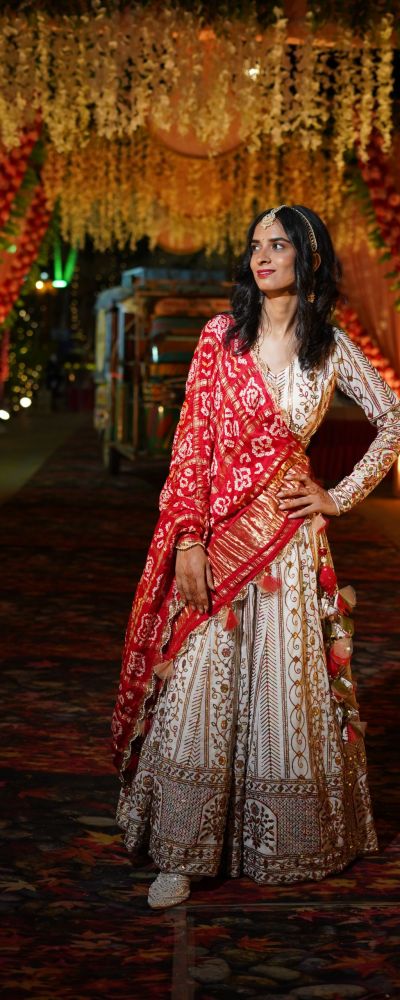 White Embroidered lehenga with Red pure gharchola dupatta