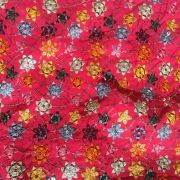 Multi colour faux mirror like sequin embroidery in floral pattern on poly Georgette Rani Pink fabric