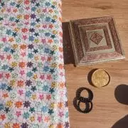 Multi colour faux mirror like sequin embroidery in floral pattern on poly Georgette White fabric