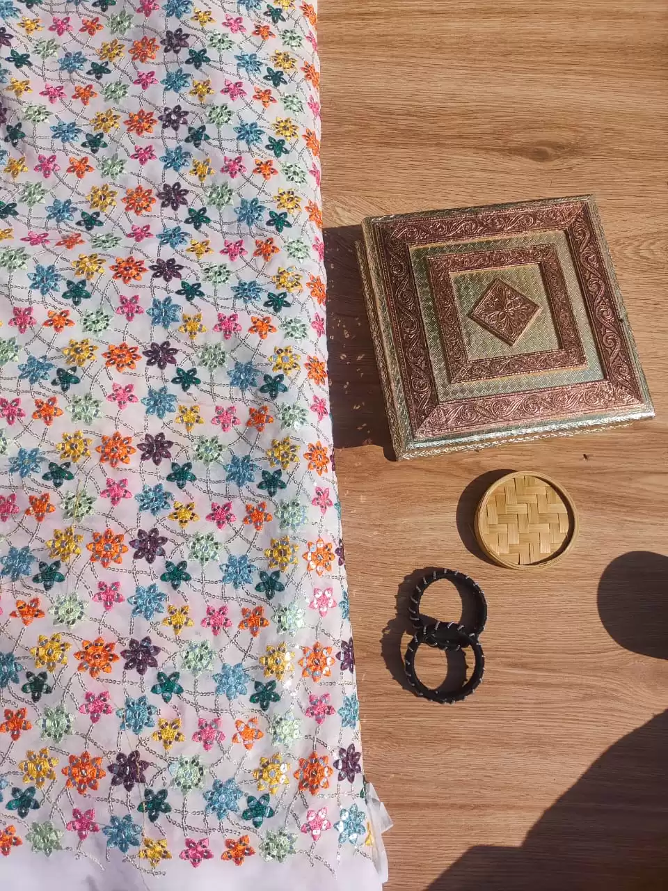 Multi colour faux mirror like sequin embroidery in floral pattern on poly Georgette White fabric