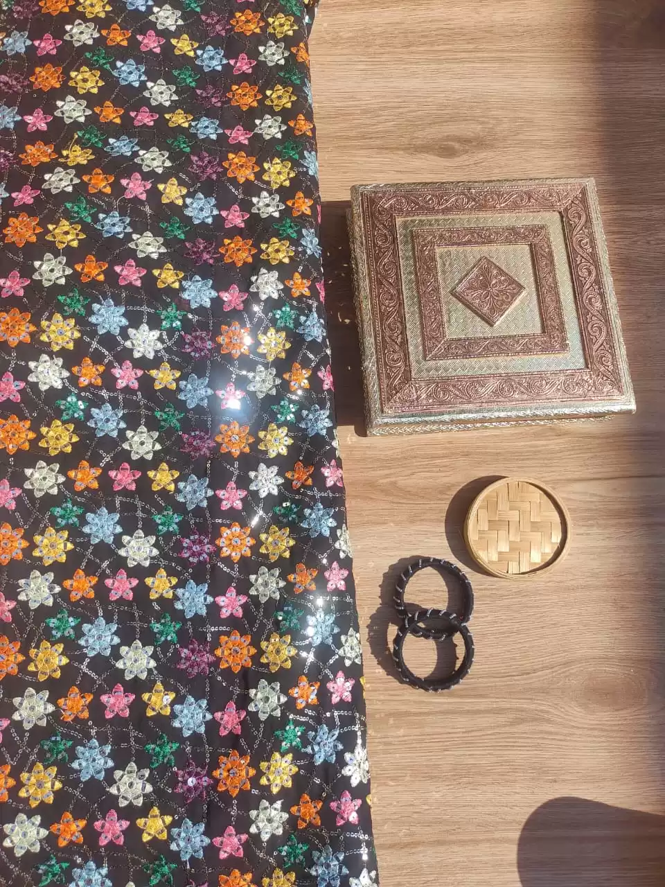 Multi colour faux mirror like sequin embroidery in floral pattern on poly Georgette Black fabric