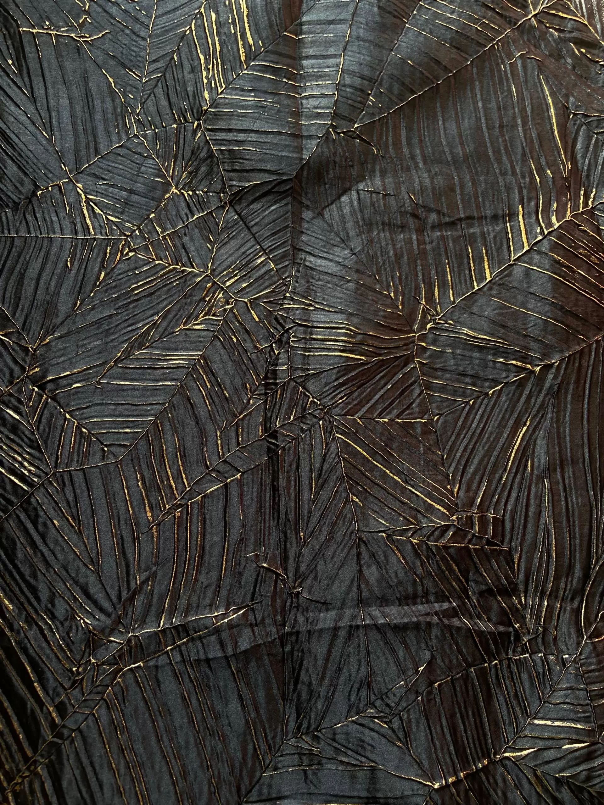 Black Crushed pleated fabric in abstract design with Gold foil detailing