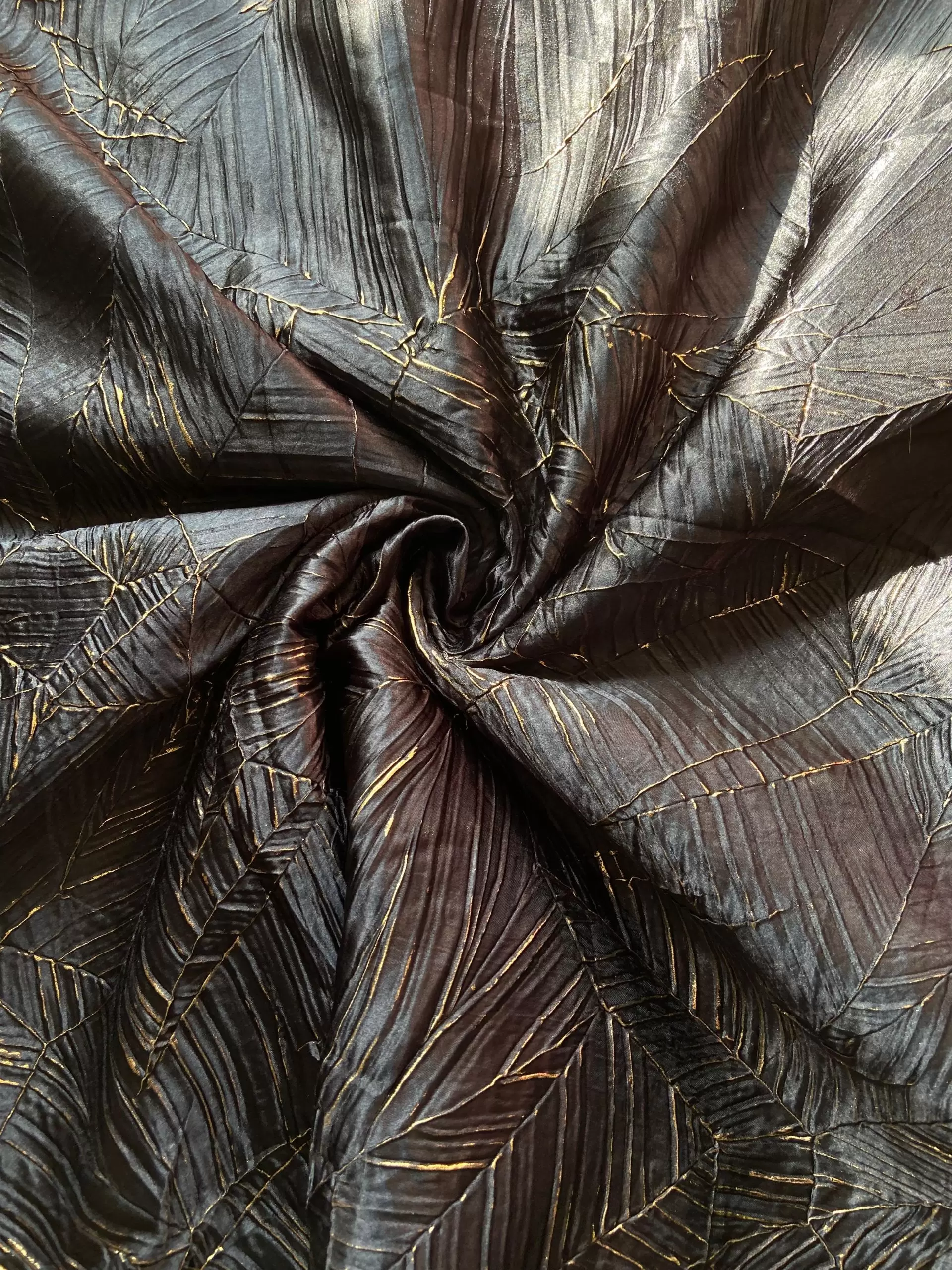 Black Crushed pleated fabric in abstract design with Gold foil detailing