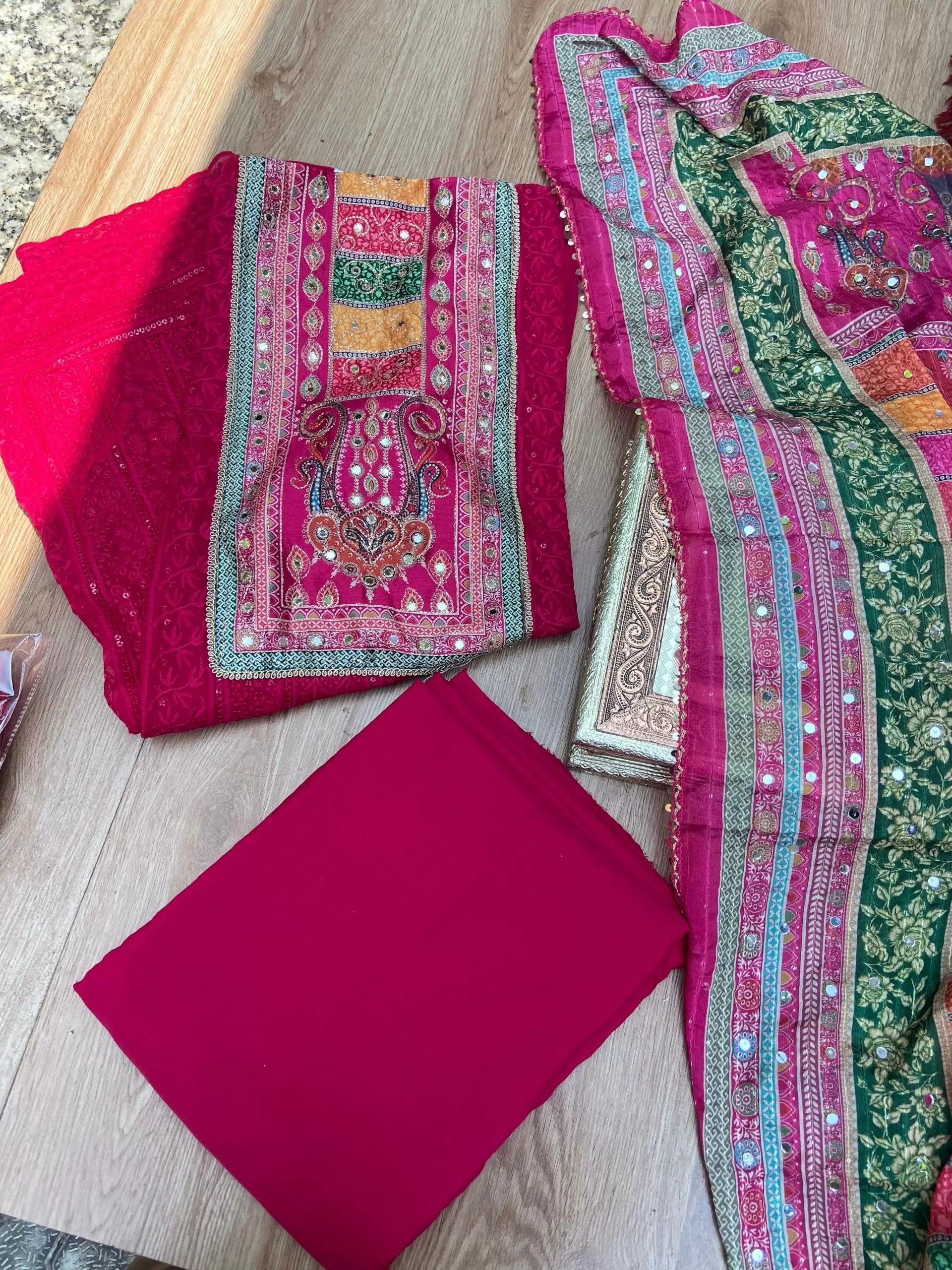 Rani Pink Chikankari georgette piece with multi floral patch and dupatta with mirror detailing unstitched suit set