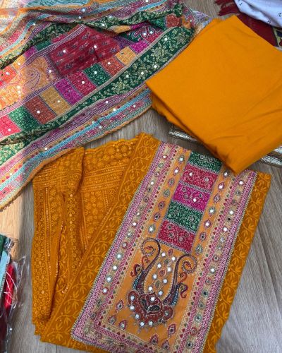 Orange Chikankari georgette piece with multi floral patch and dupatta with mirror detailing unstitched suit set