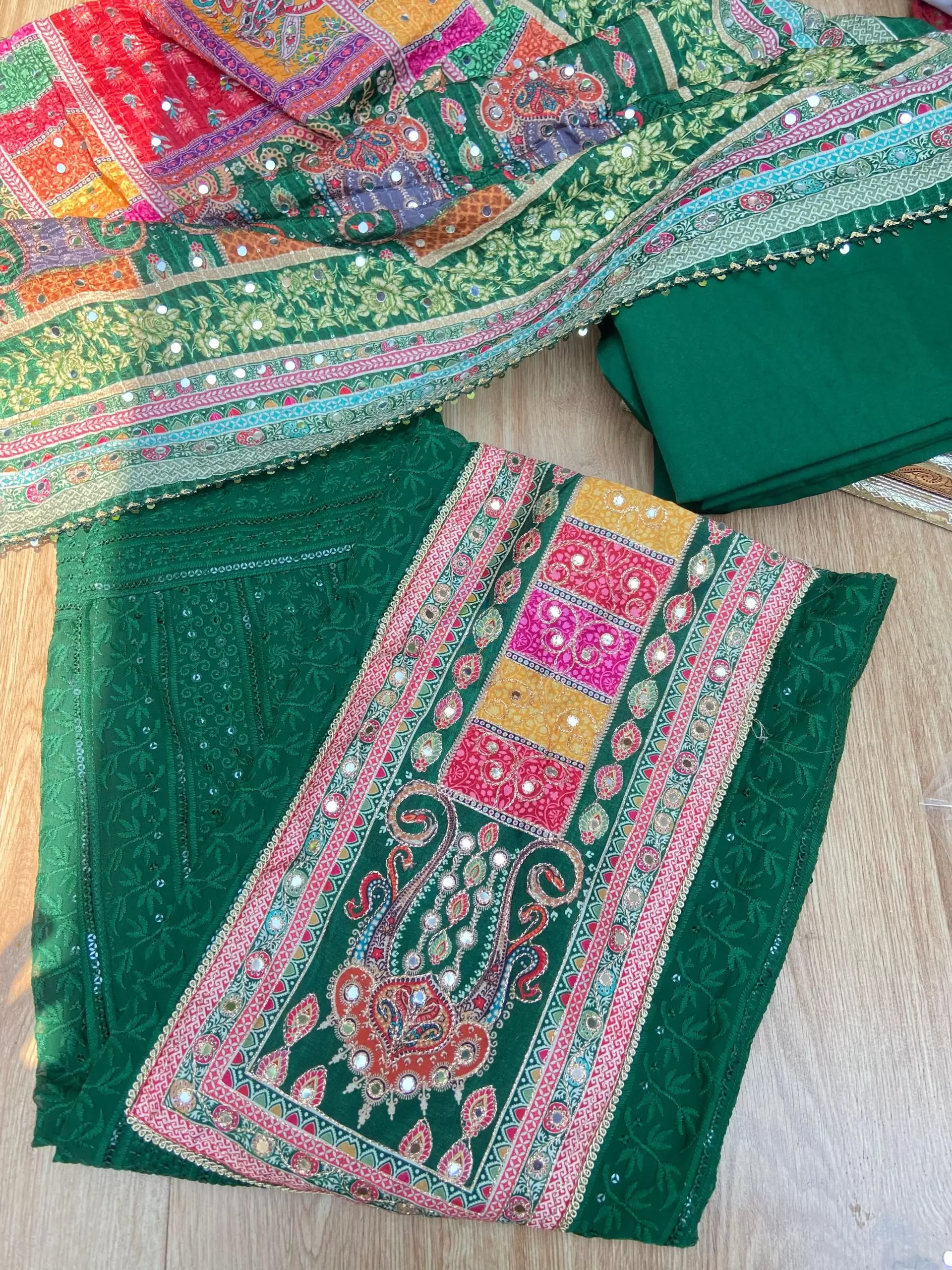 Bottle Green Chikankari georgette piece with multi floral patch and dupatta with mirror detailing unstitched suit set