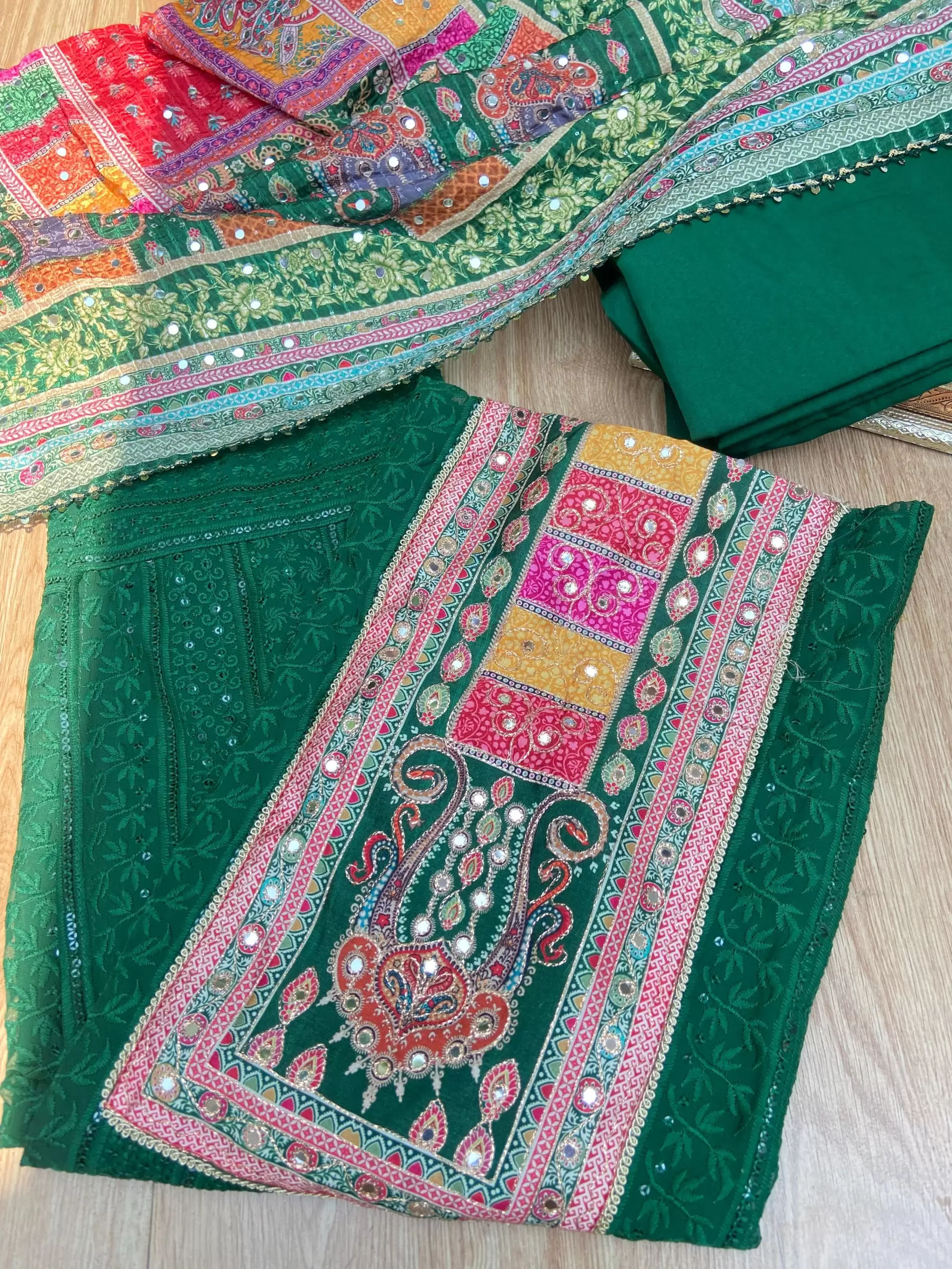 Bottle Green Chikankari georgette piece with multi floral patch and dupatta with mirror detailing unstitched suit set
