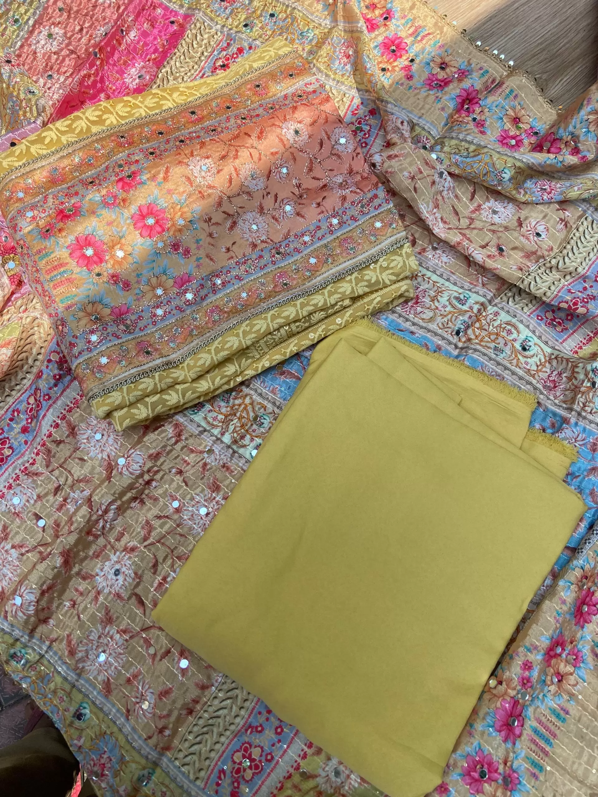 Yellow Chikankari georgette piece with multi floral patch and dupatta with mirror detailing unstitched suit set