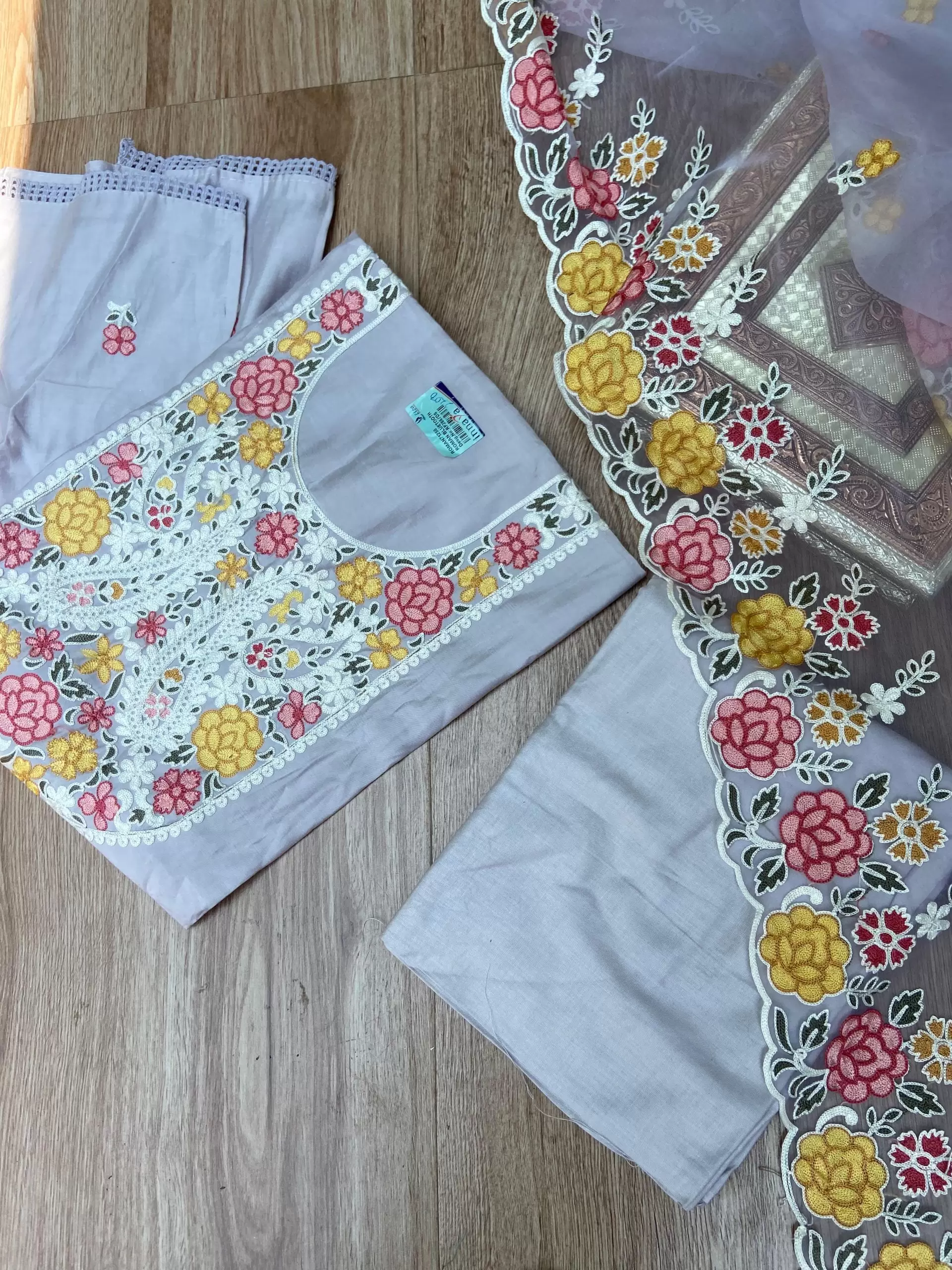 Gray pure cotton heavy multi coloured thread embroidered unstitched suit set with organza dupatta