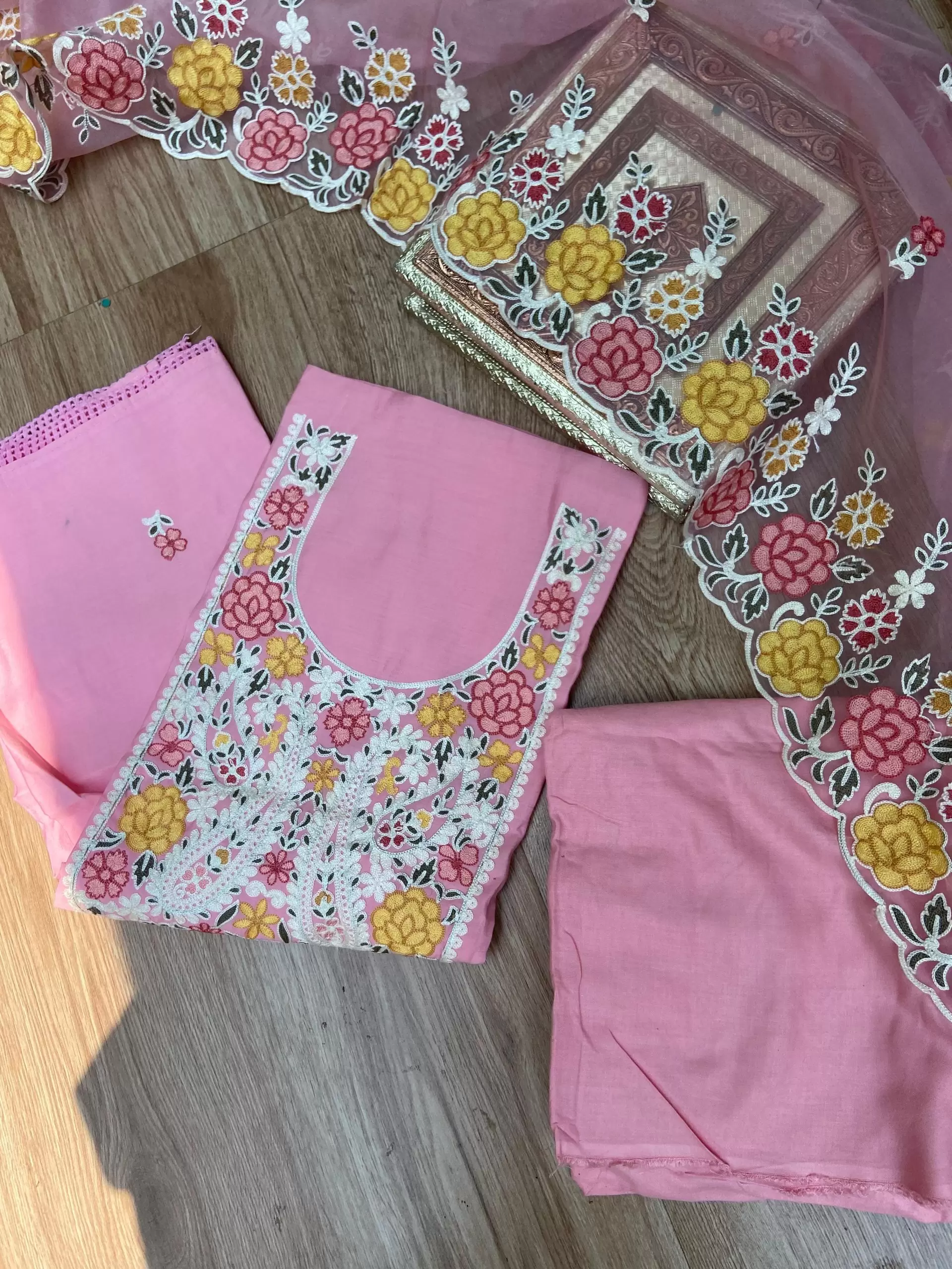 Pink pure cotton heavy multi coloured thread embroidered unstitched suit set with organza dupatta