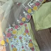 Yellow pure cotton heavy multi coloured thread embroidered unstitched suit set with organza dupatta