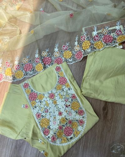 Yellow pure cotton heavy multi coloured thread embroidered unstitched suit set with organza dupatta