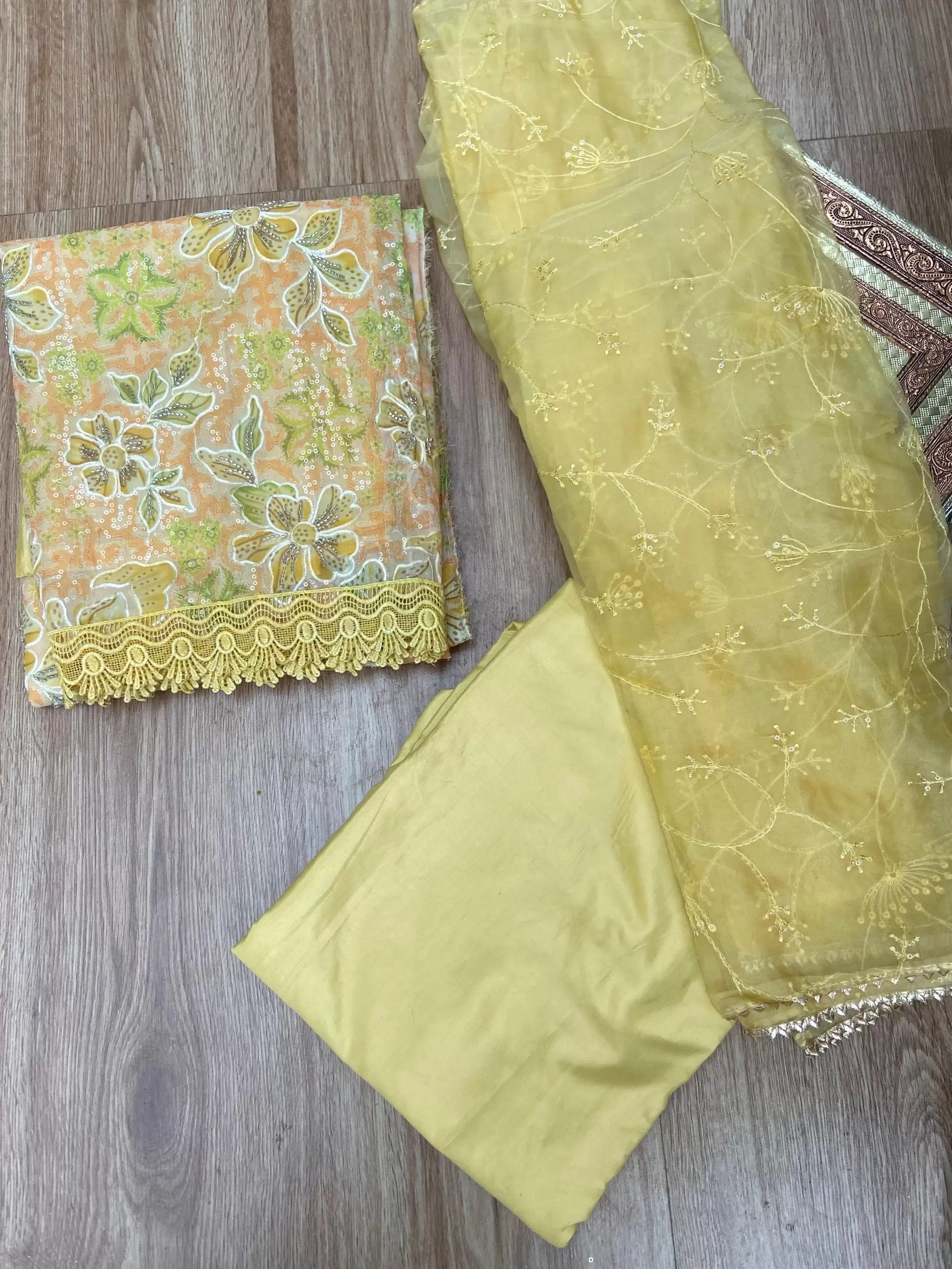 Yellow floral printed Organza unstitched suit set with Cut dana & sequin embroidery, Lace detailing and dupatta