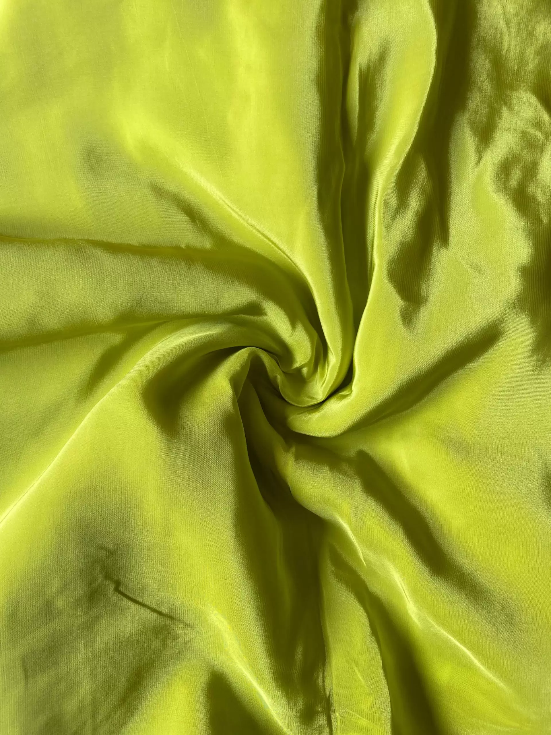 Parrot green plain pure crepe fabric