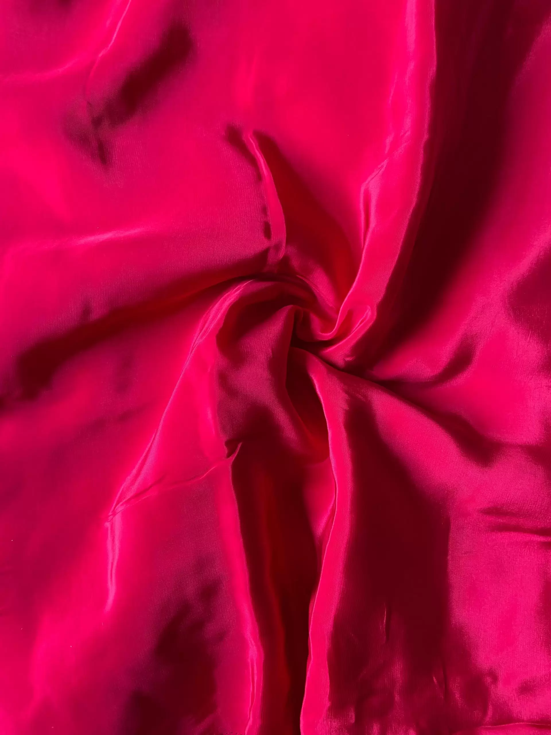 Rani pink plain pure crepe fabric