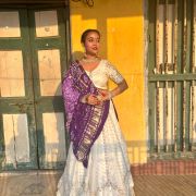 White chandani lehenga made from organza satin with heavy daman style embroidery( with white dupatta)