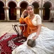 White chandani lehenga made from organza satin with heavy daman style embroidery( with white dupatta)