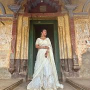 White chandani lehenga made from organza satin with heavy daman style embroidery( with white dupatta)