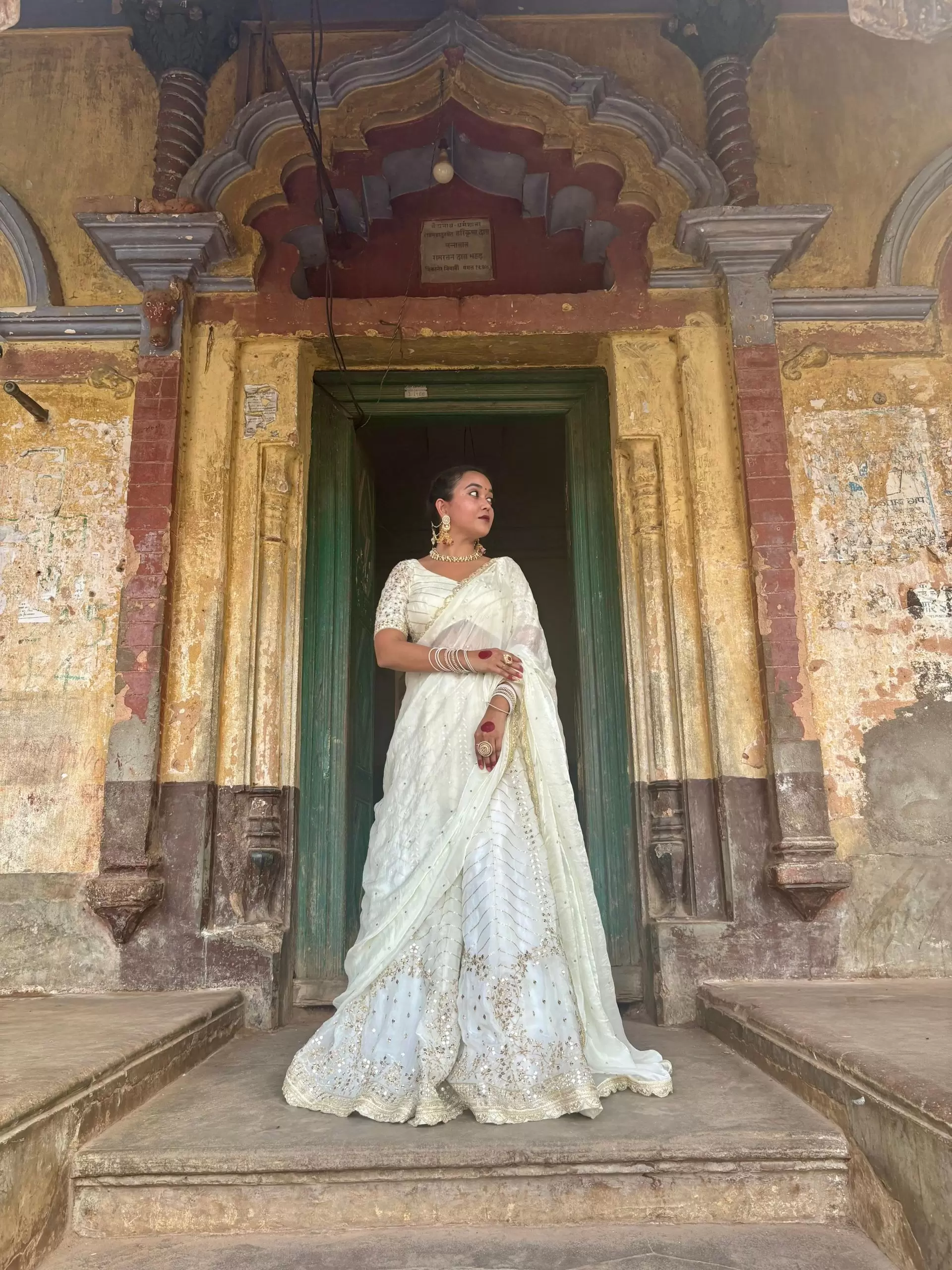 White chandani lehenga made from organza satin with heavy daman style embroidery( with white dupatta)