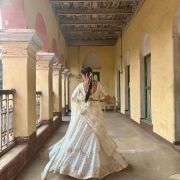 White chandani lehenga made from organza satin with heavy daman style embroidery( with white dupatta)
