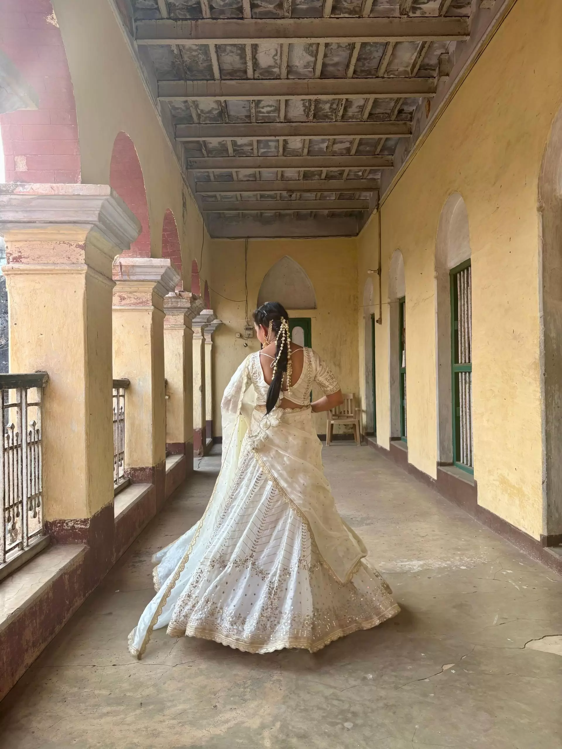 White chandani lehenga made from organza satin with heavy daman style embroidery( with white dupatta)