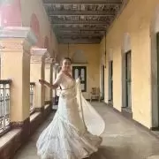 White chandani lehenga made from organza satin with heavy daman style embroidery( with white dupatta)