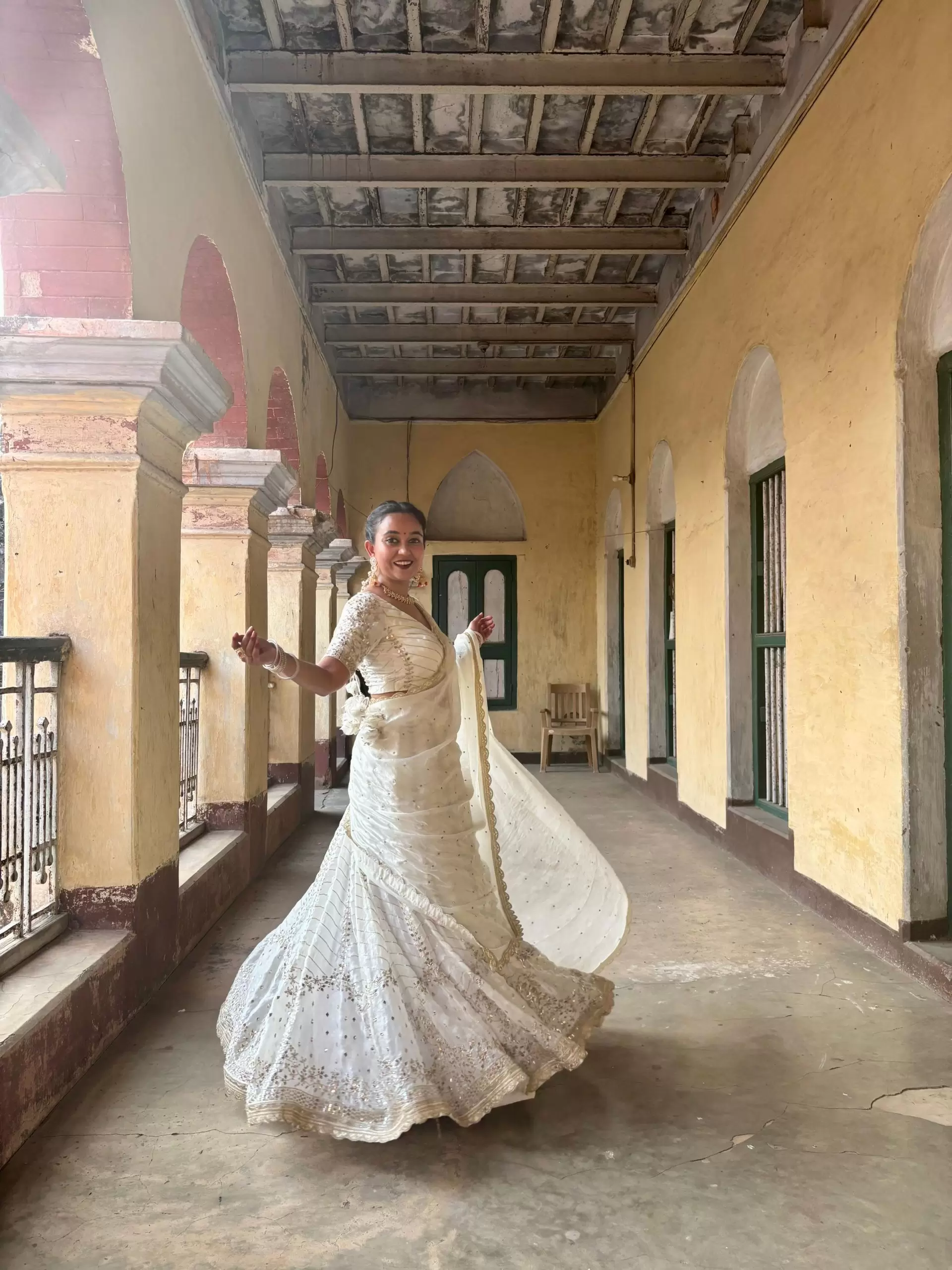 White chandani lehenga made from organza satin with heavy daman style embroidery( with white dupatta)