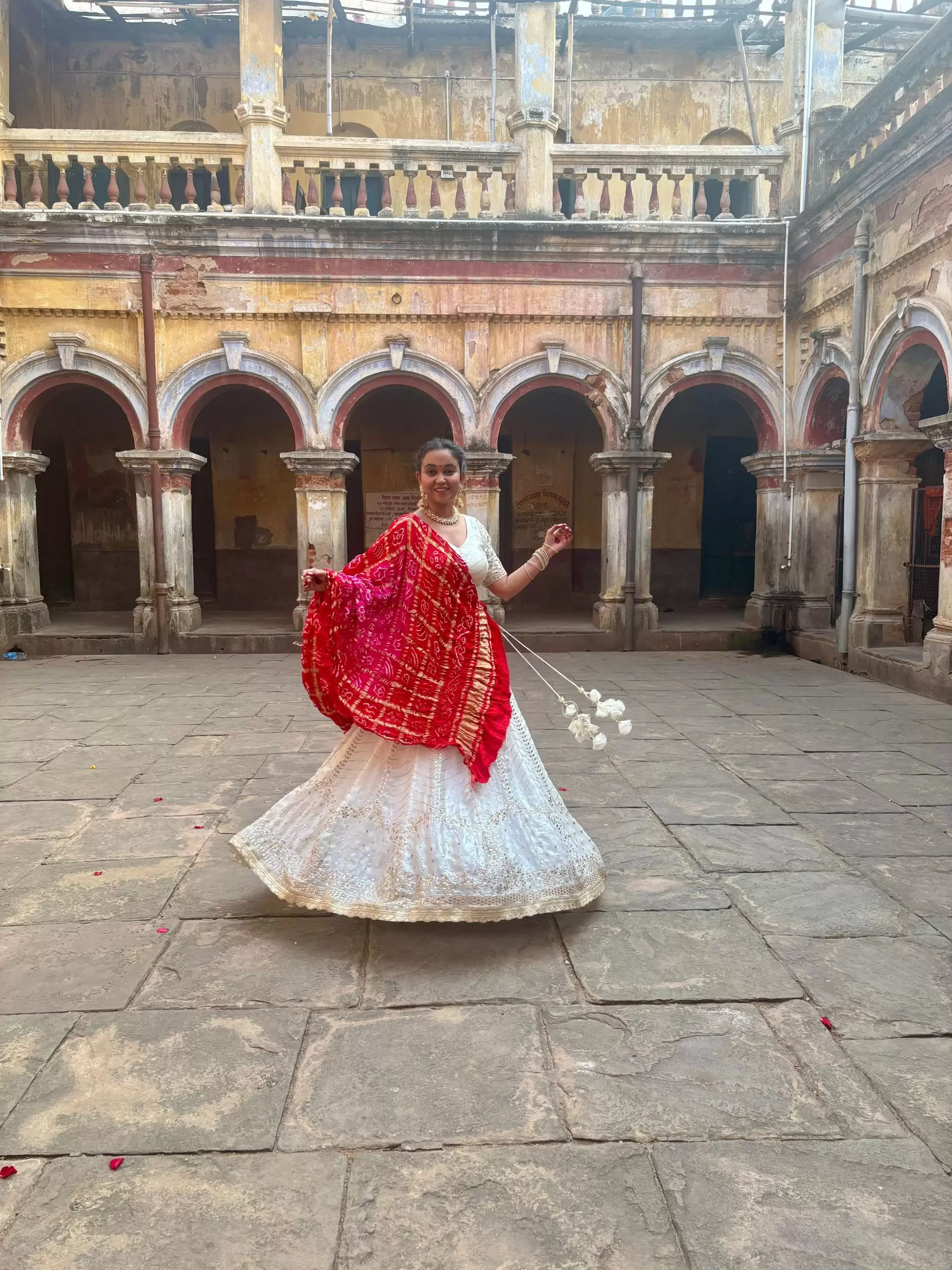 White chandani lehenga made from organza satin with heavy daman style embroidery( with white dupatta)