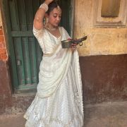 White chandani lehenga made from organza satin with heavy daman style embroidery( with white dupatta)