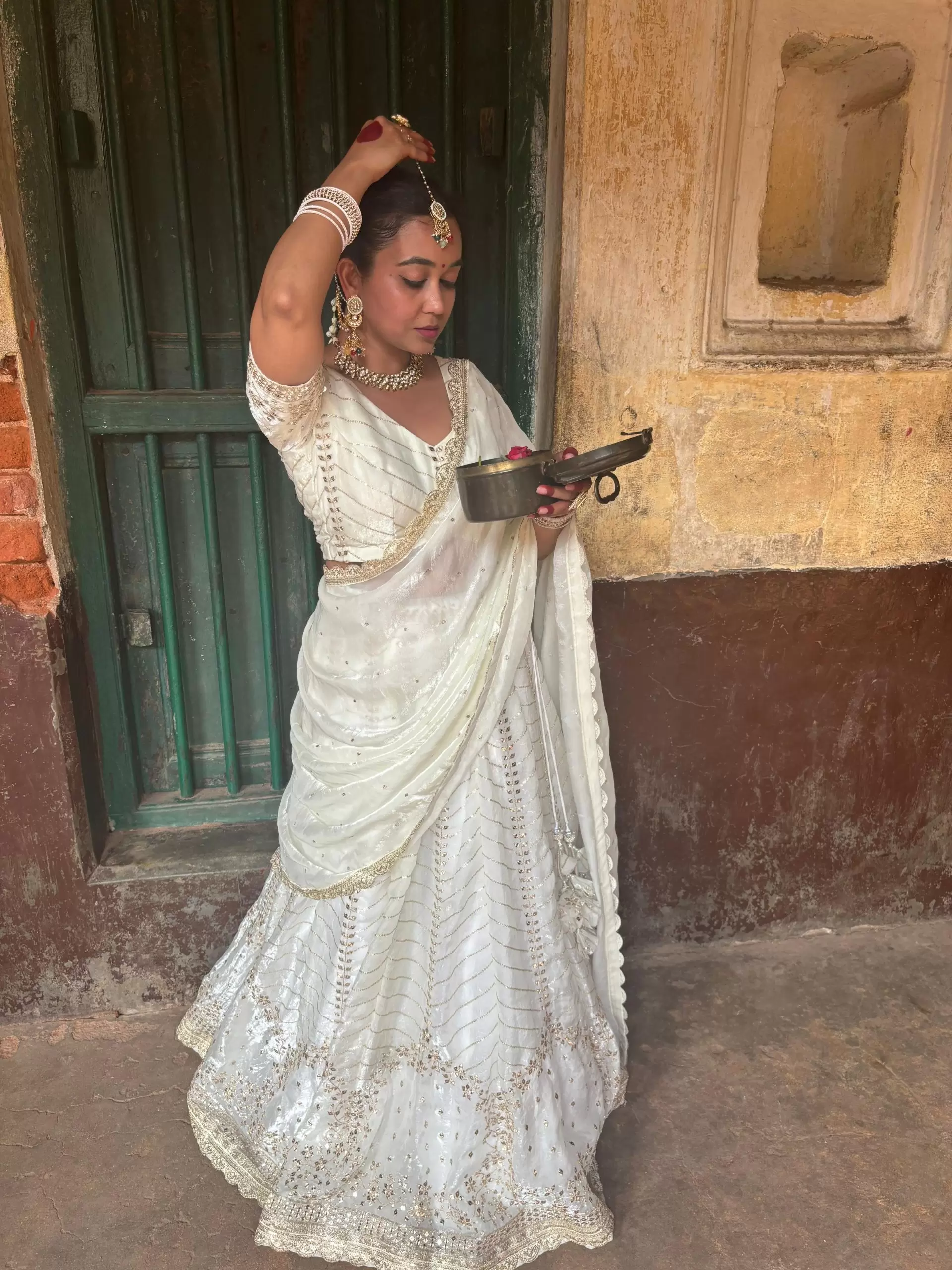 White chandani lehenga made from organza satin with heavy daman style embroidery( with white dupatta)