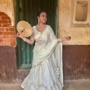 White chandani lehenga made from organza satin with heavy daman style embroidery( with white dupatta)