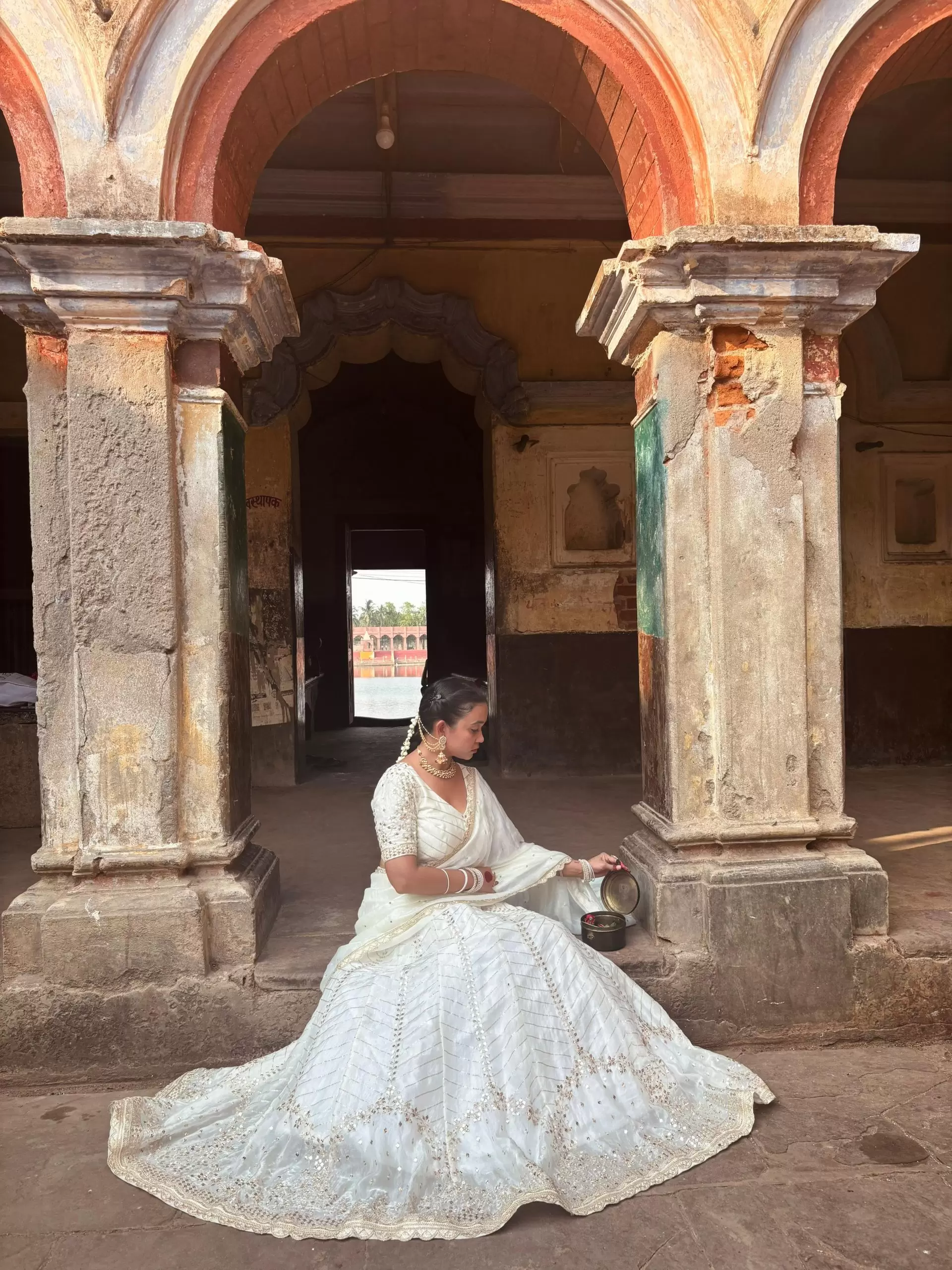 White chandani lehenga made from organza satin with heavy daman style embroidery( with white dupatta)