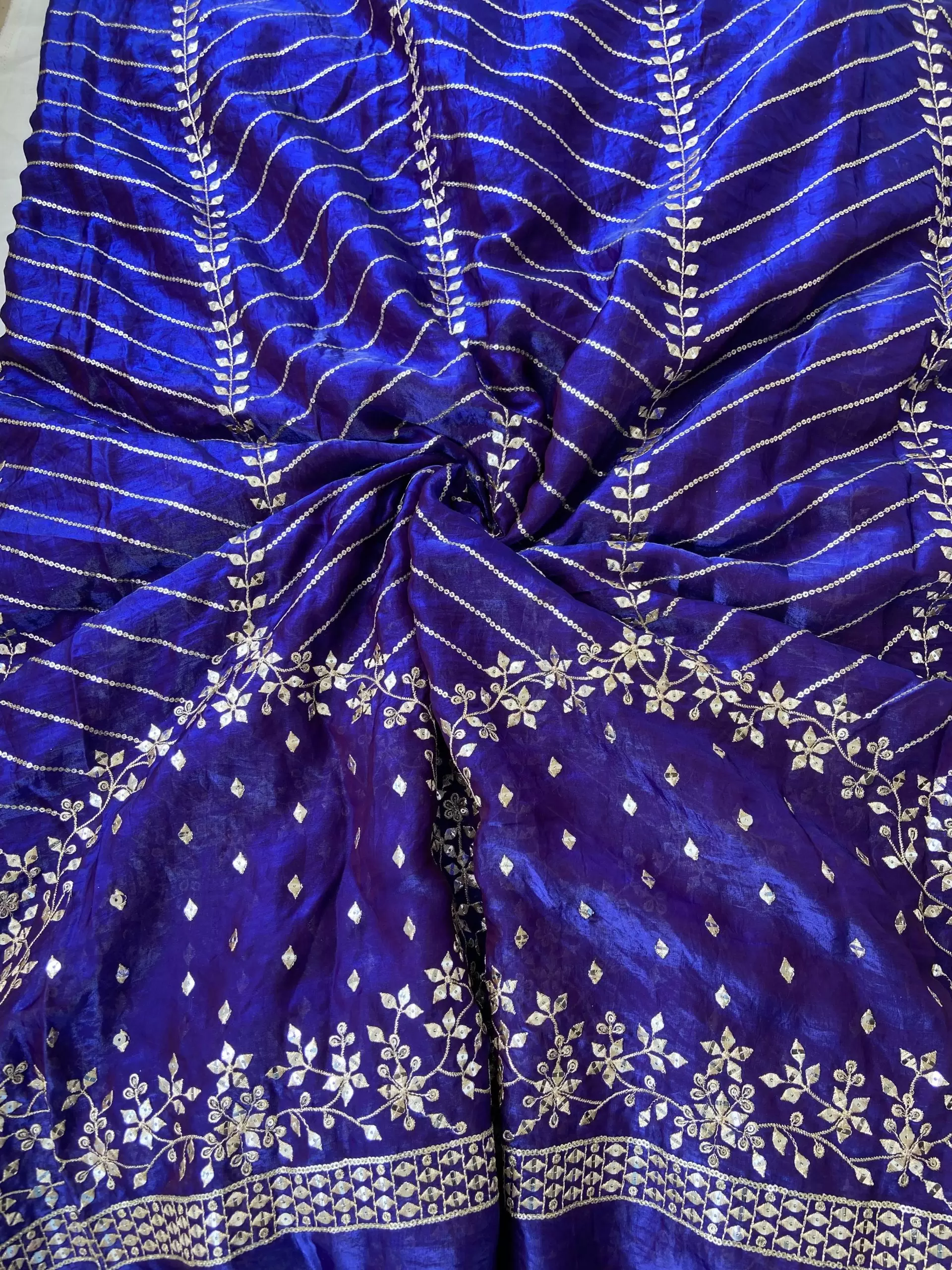 Blue organza satin with heavy daman style zari and sequin embroidery fabric