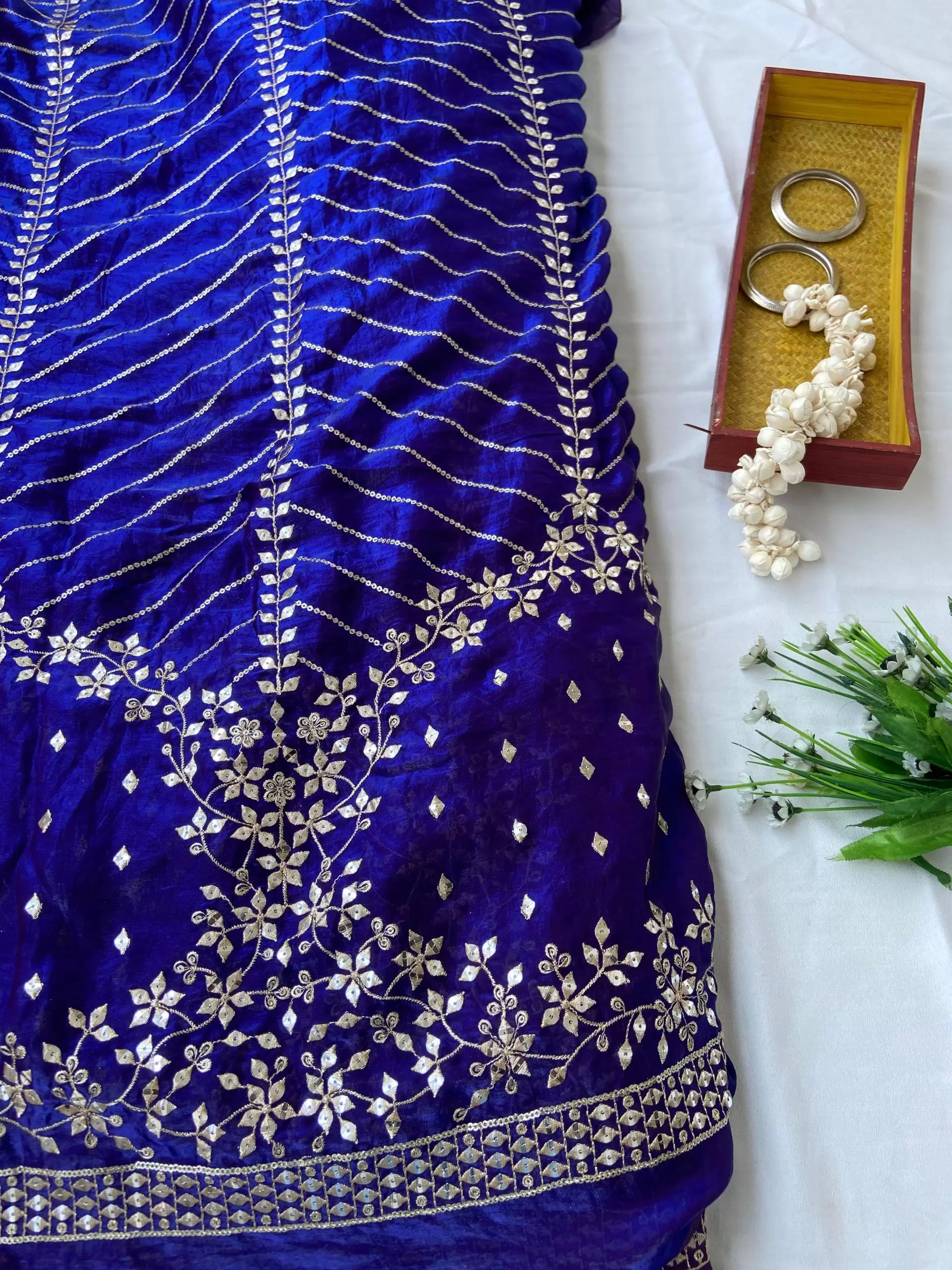 Blue organza satin with heavy daman style zari and sequin embroidery fabric