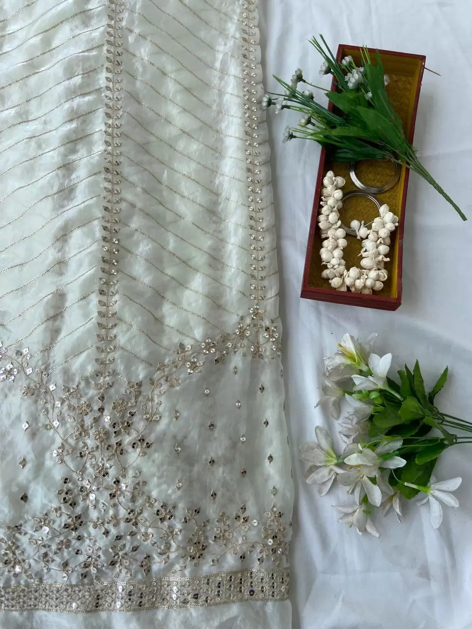 White organza satin with heavy daman style zari and sequin embroidery fabric