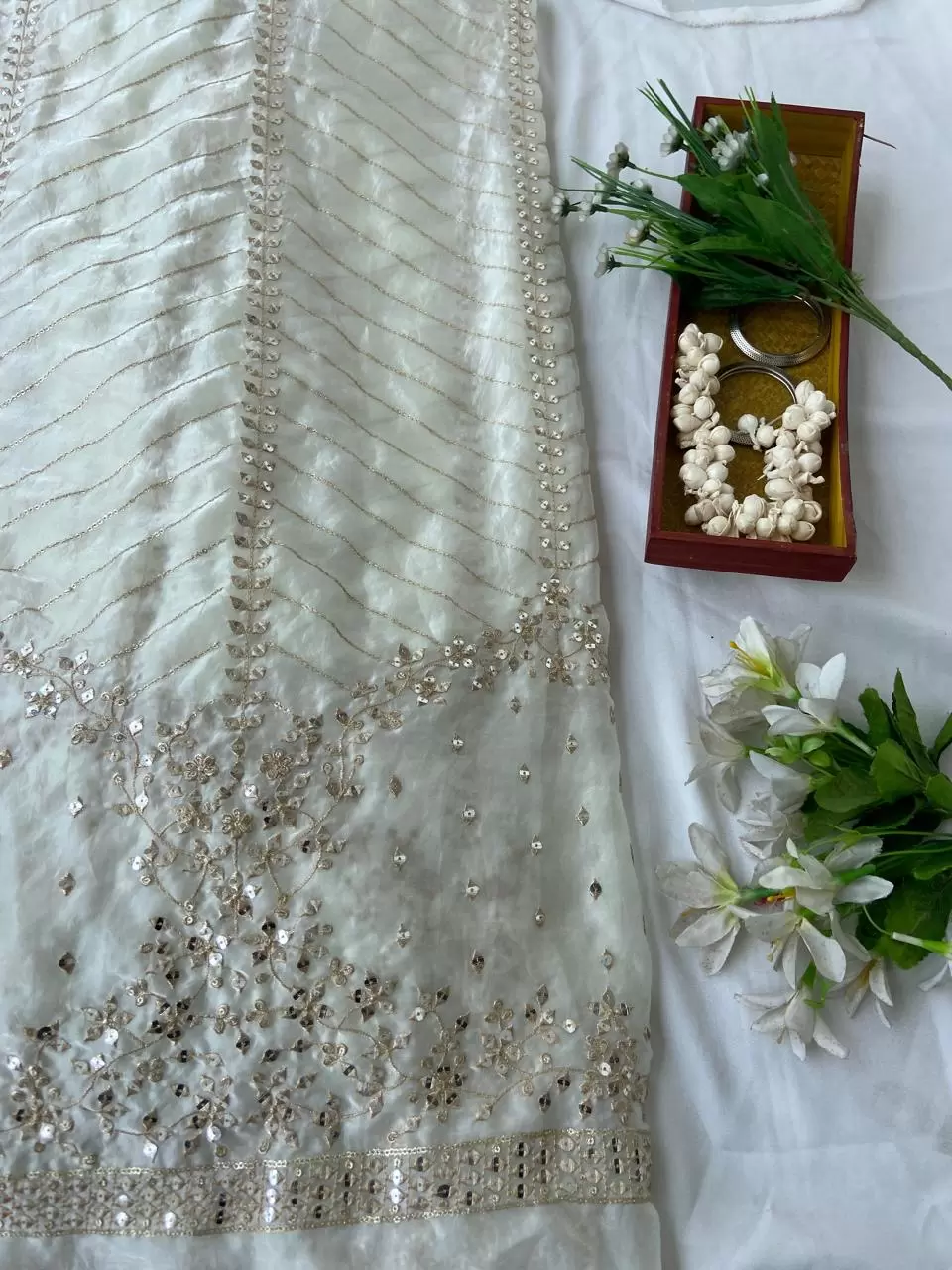 White organza satin with heavy daman style zari and sequin embroidery fabric