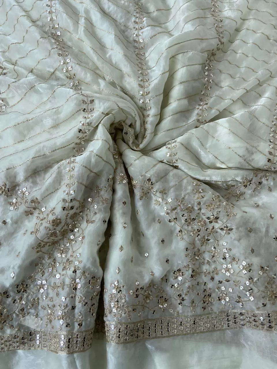 White organza satin with heavy daman style zari and sequin embroidery fabric