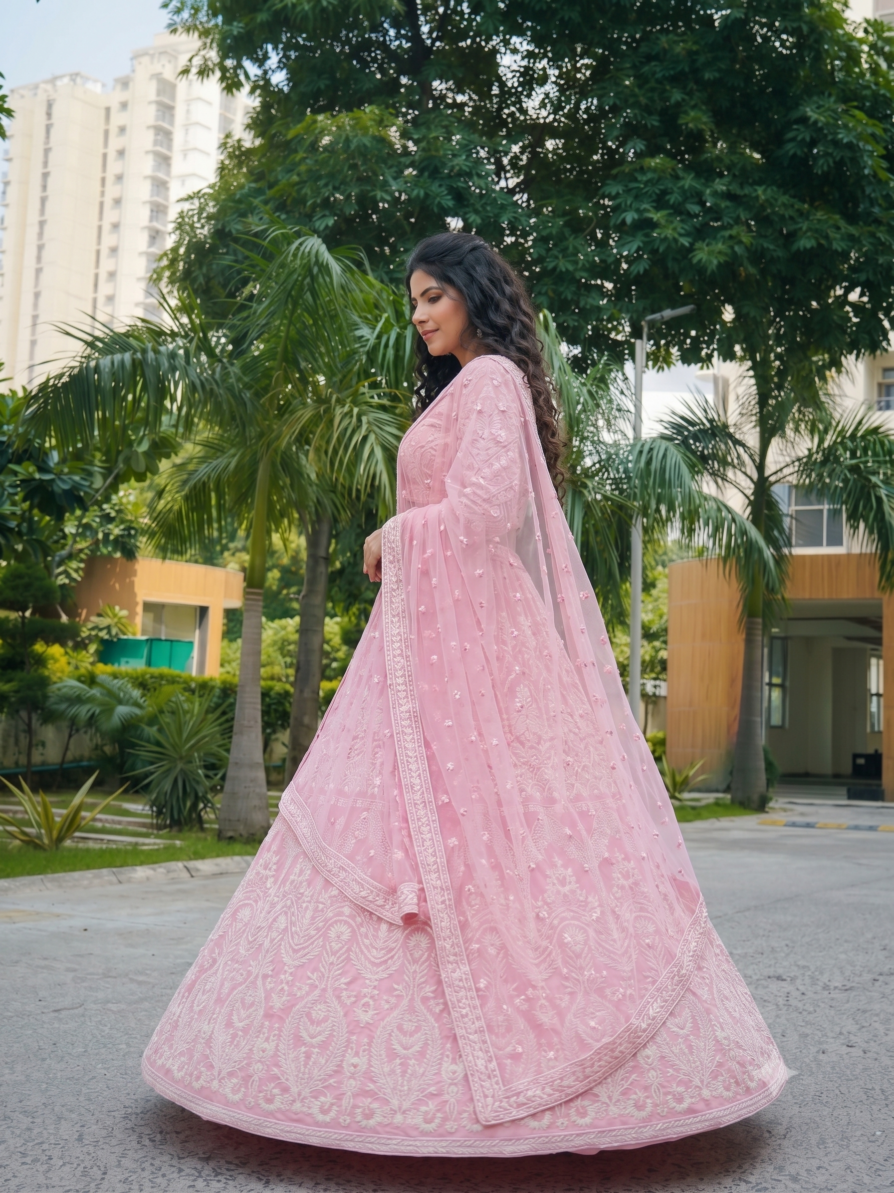 Baby pink lehenga style with white thread embroidery on georgette fabric