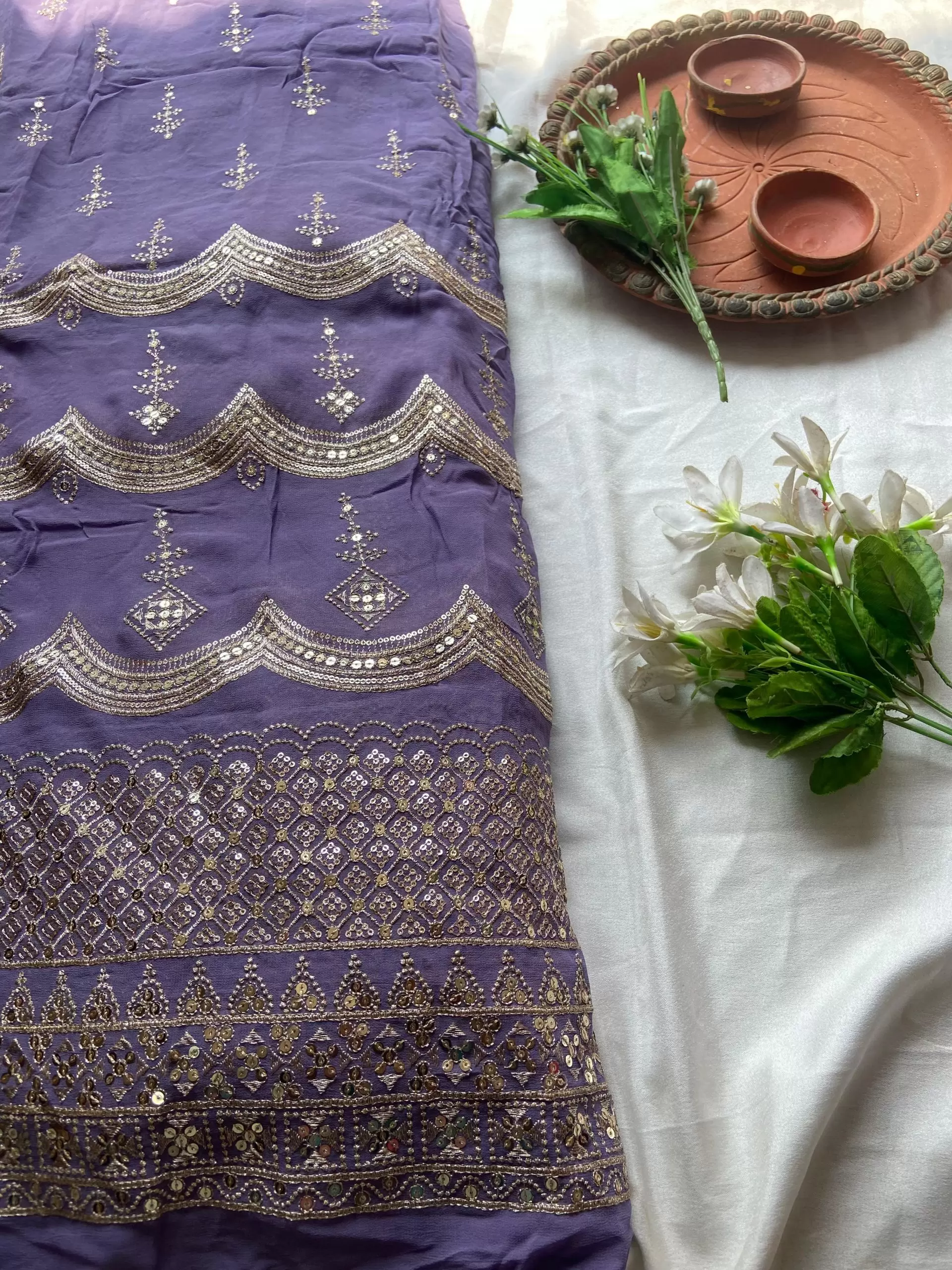 Pure georgette daman embroidered fabric in mauve purple