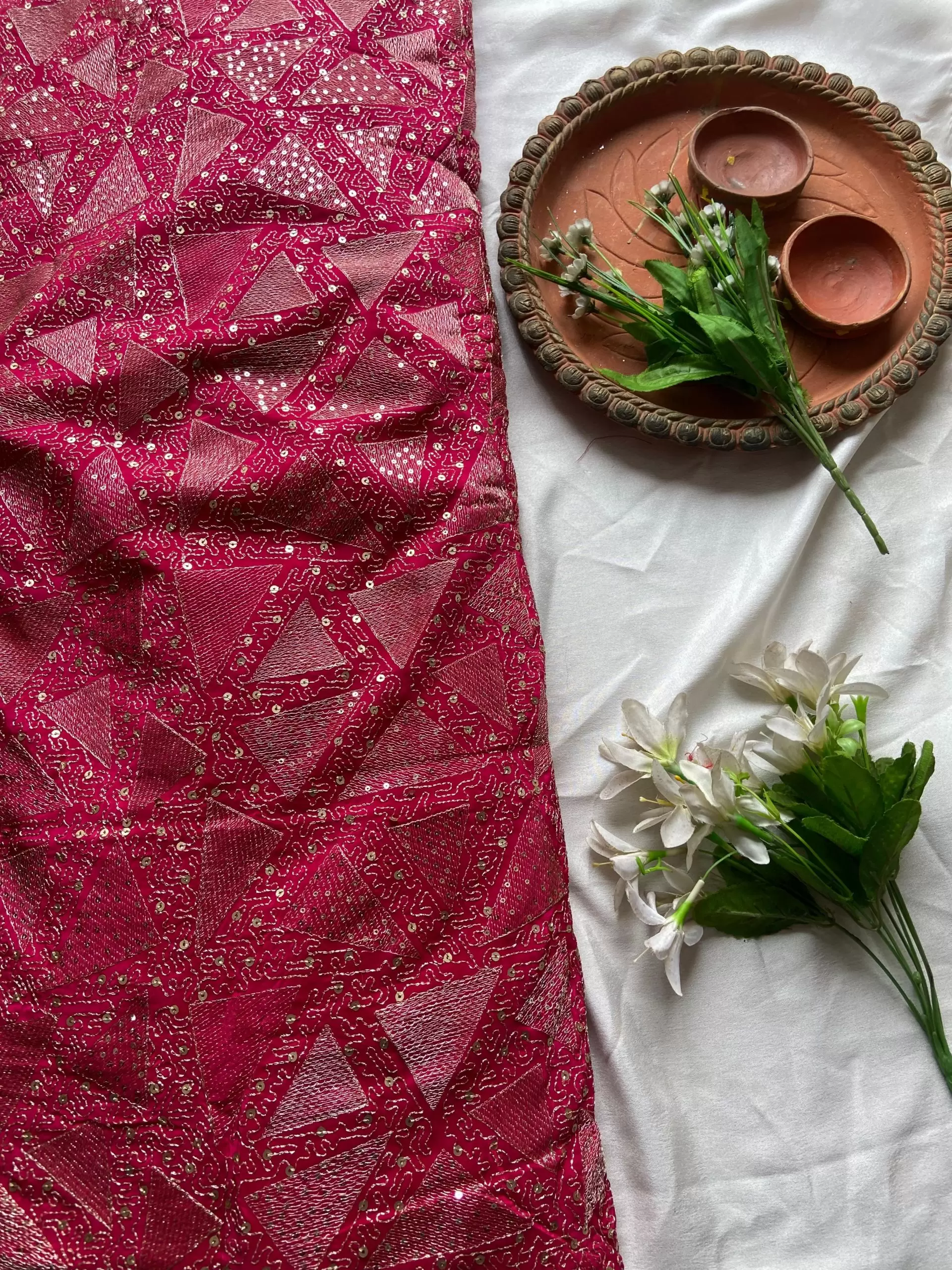 Triangular pattern sequin and zari embroidered Rani Pink Pure crepe fabric