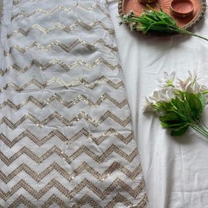 Heavy zari and sequin embroidery zig zag pattern on white georgette fabric