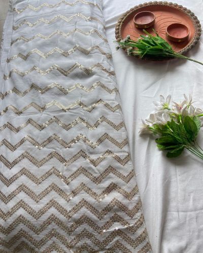 Heavy zari and sequin embroidery zig zag pattern on white georgette fabric