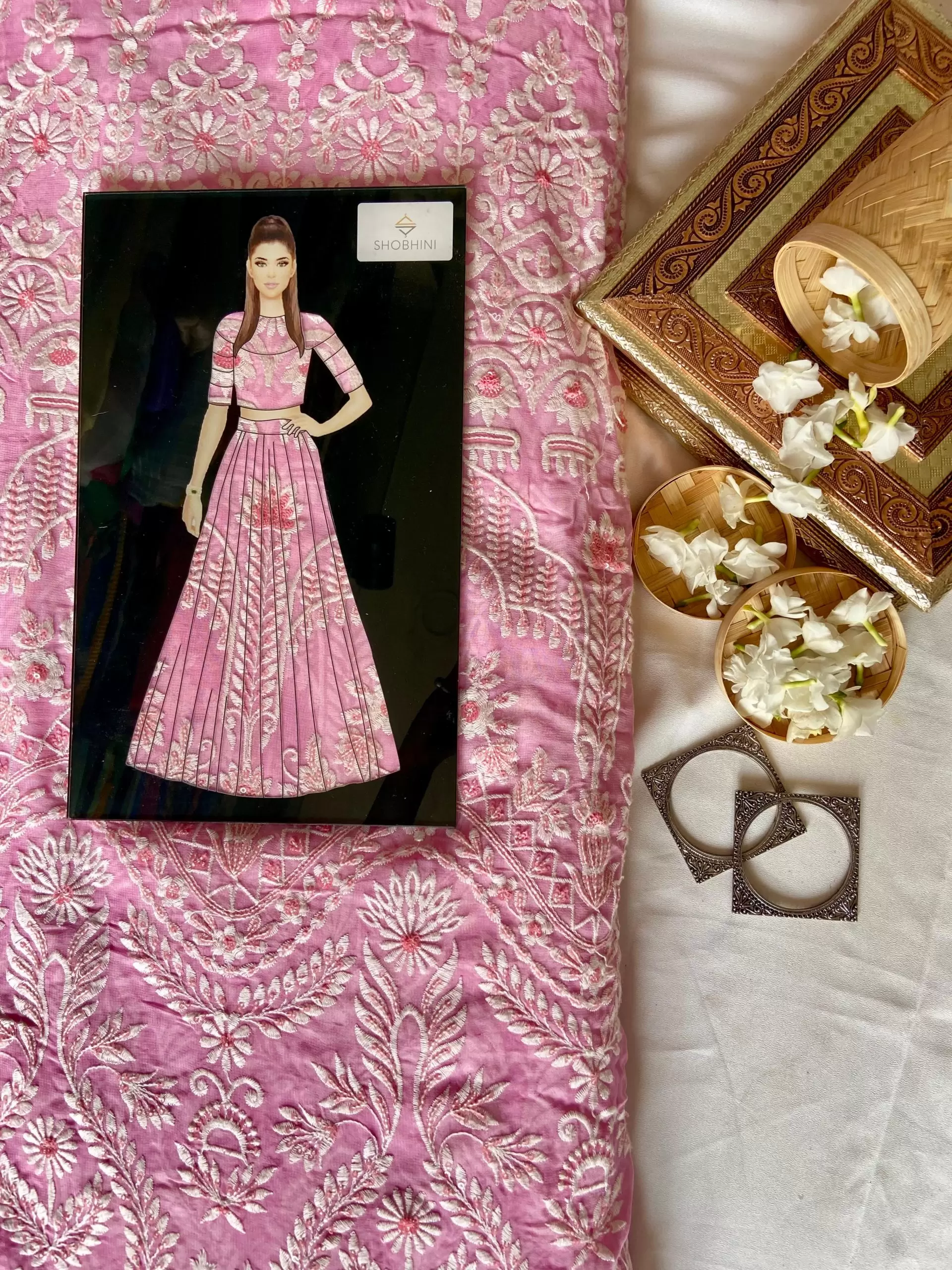 Baby pink lehenga style with white thread embroidery on georgette fabric