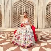 Ivory multi coloured heavy thread and sequin embroidered lehenga with hand embroidered details