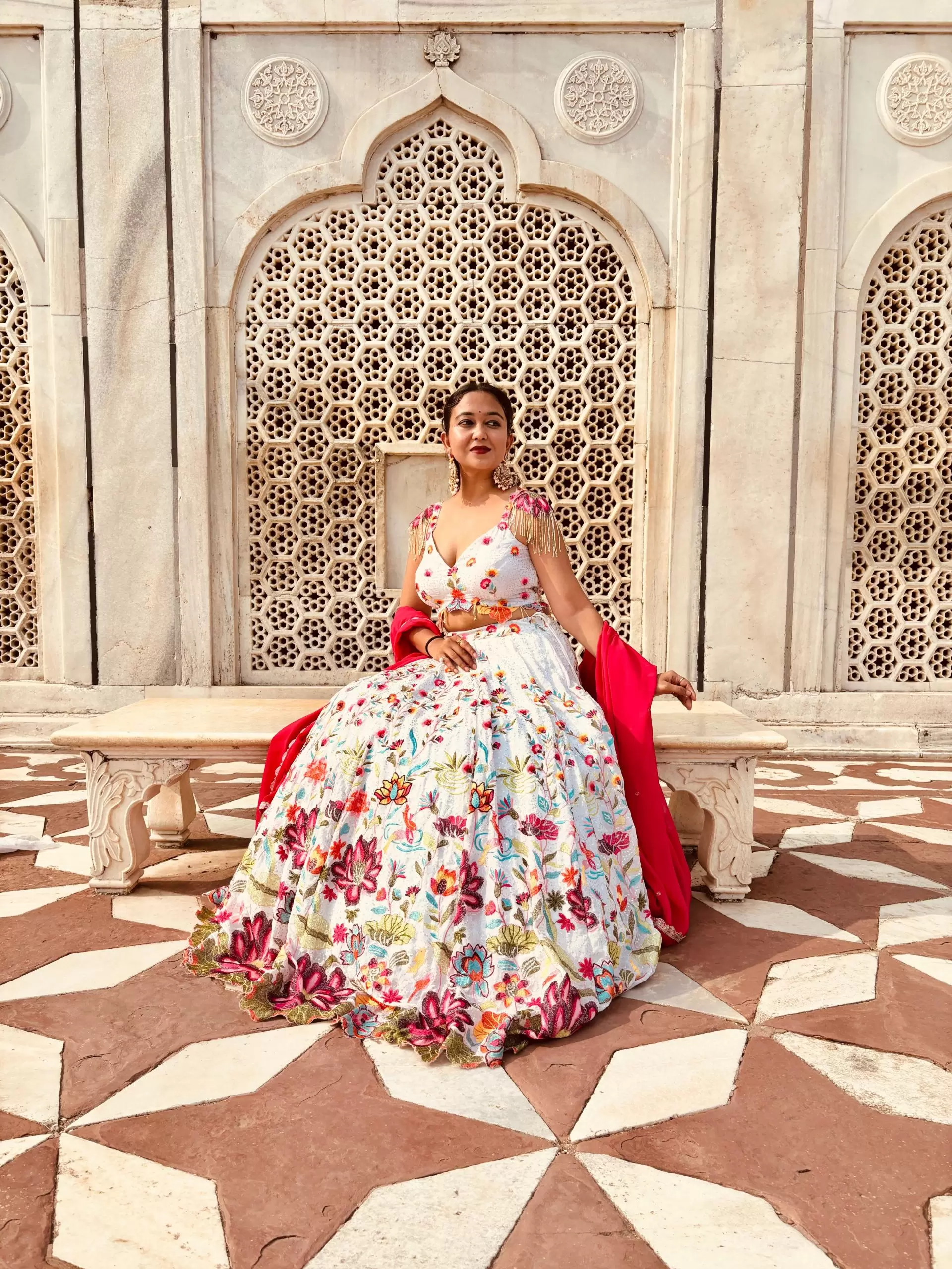 Ivory multi coloured heavy thread and sequin embroidered lehenga with hand embroidered details