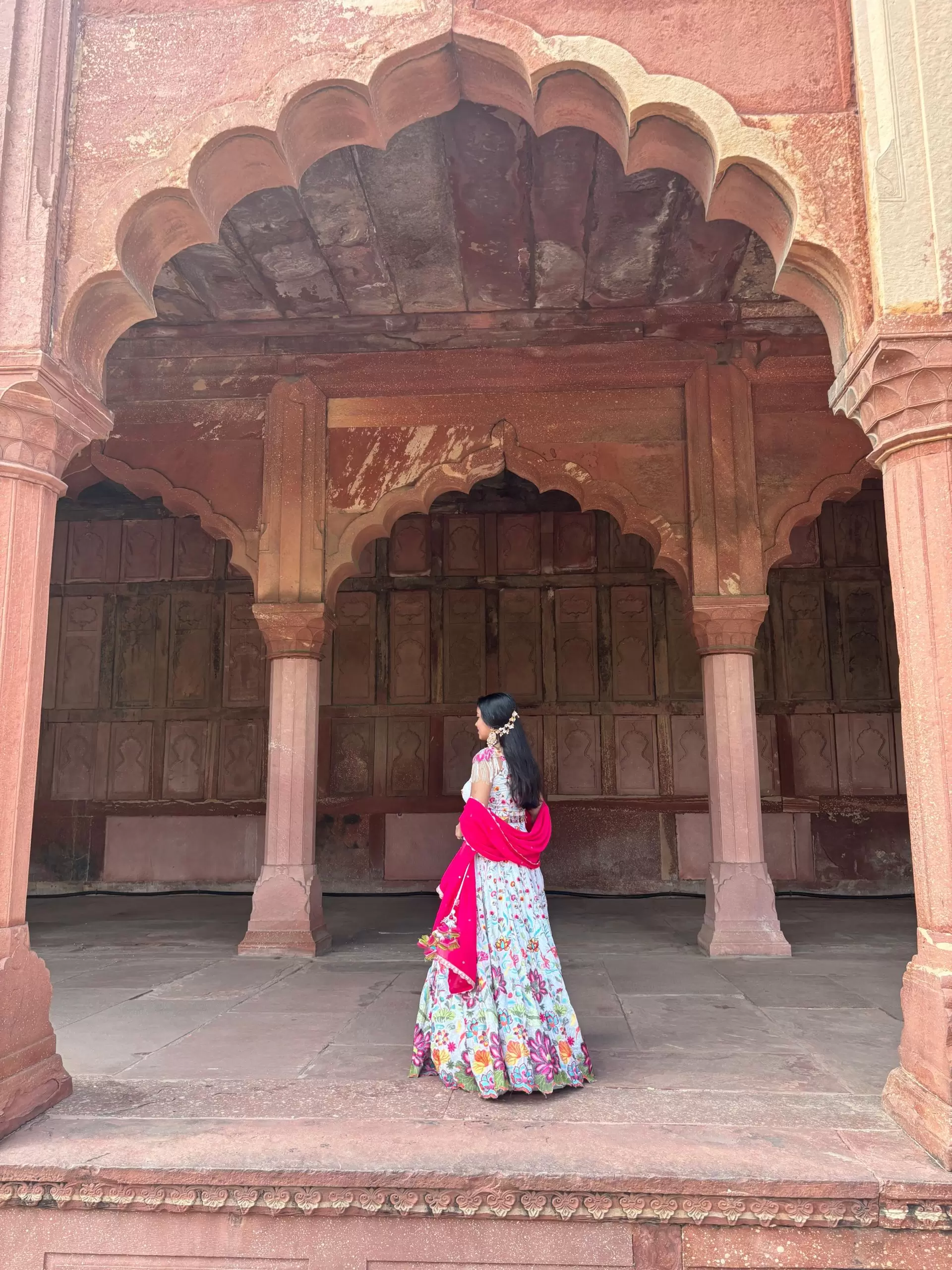 Ivory multi coloured heavy thread and sequin embroidered lehenga with hand embroidered details