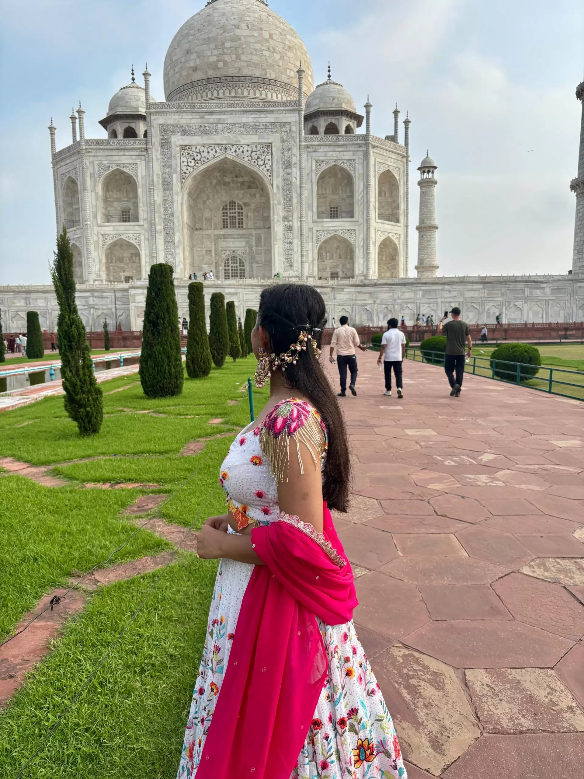 Ivory multi coloured heavy thread and sequin embroidered lehenga with hand embroidered details