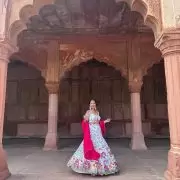 Ivory multi coloured heavy thread and sequin embroidered lehenga with hand embroidered details