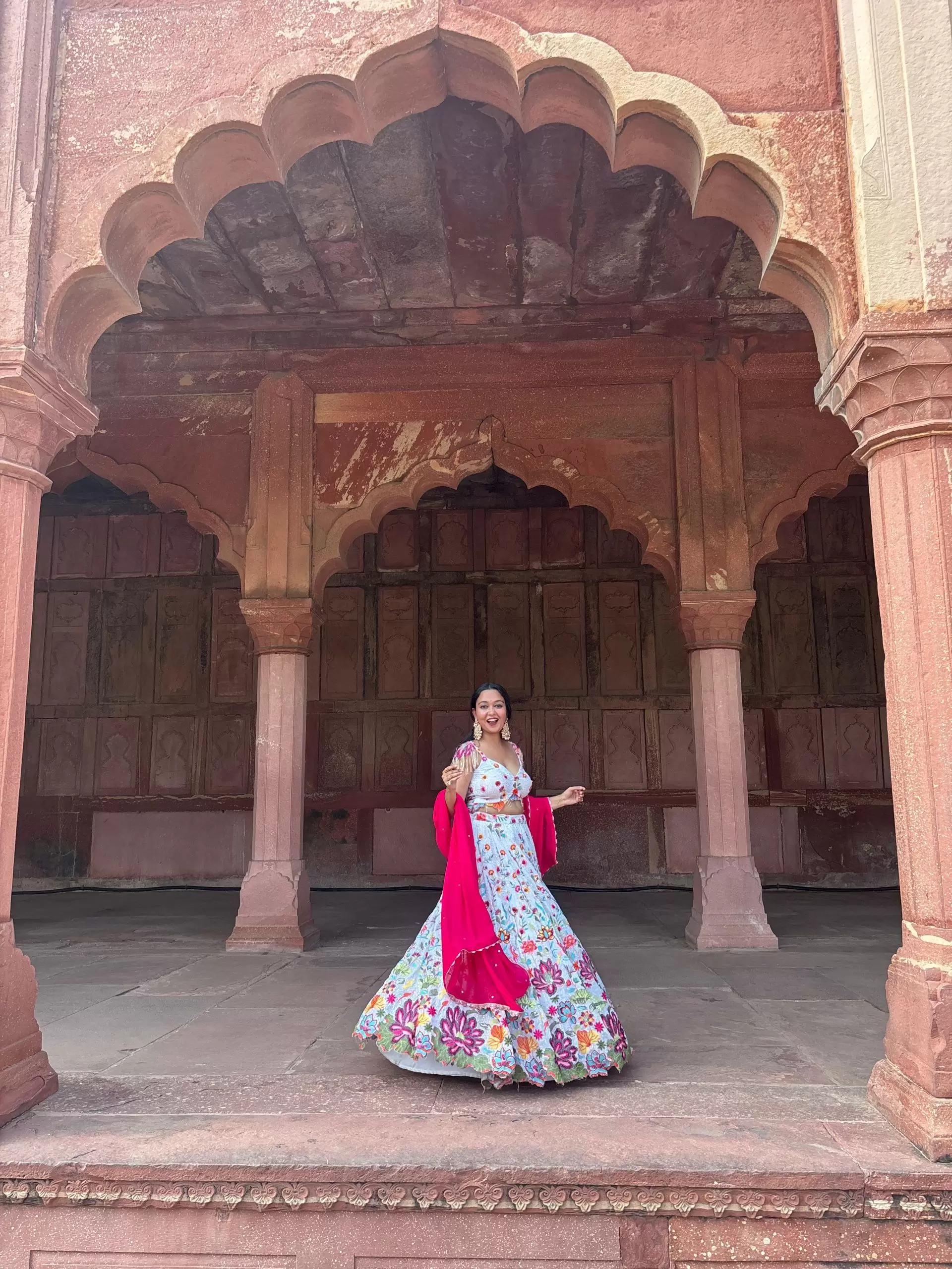 Ivory multi coloured heavy thread and sequin embroidered lehenga with hand embroidered details