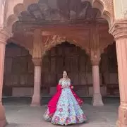 Ivory multi coloured heavy thread and sequin embroidered lehenga with hand embroidered details